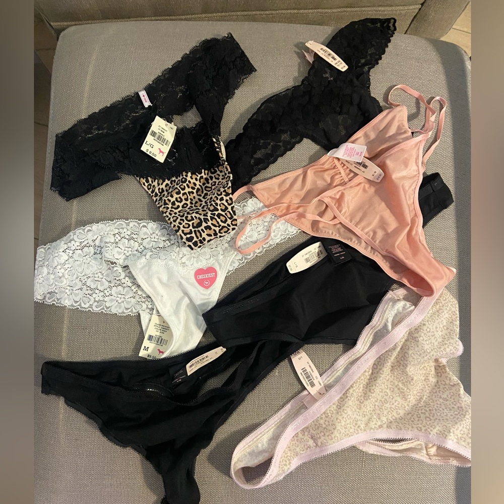 7 pairs of nwt Victoria Secret Large thongs